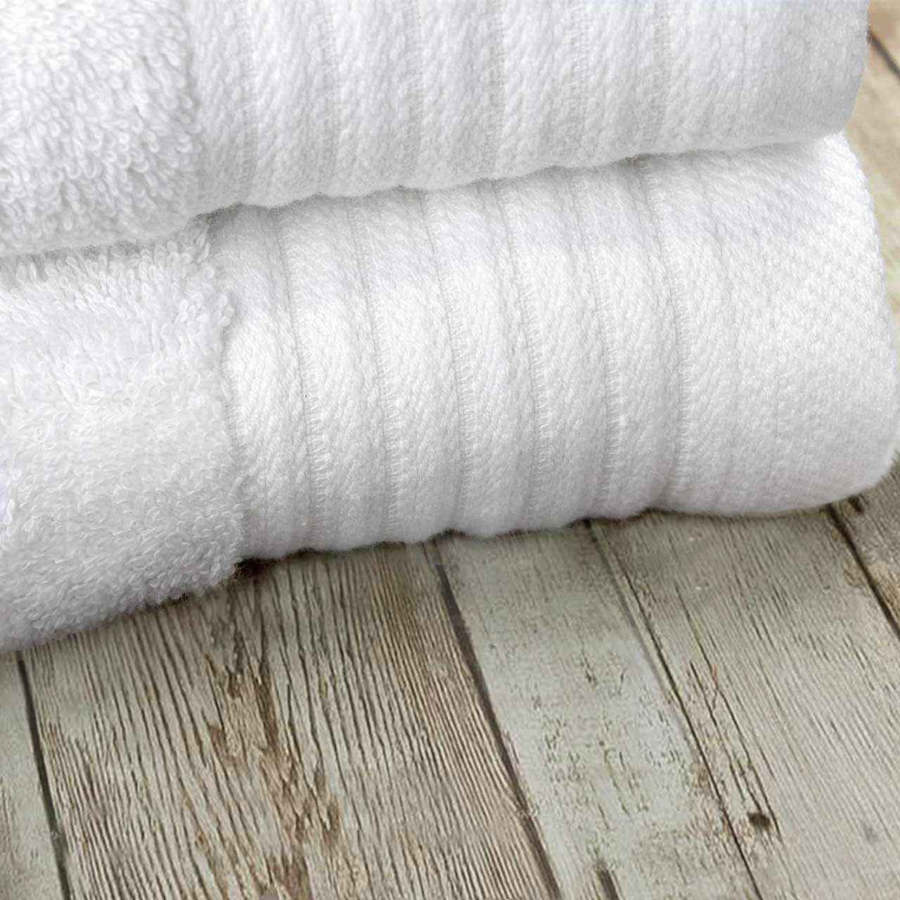 Toalla de bao Ultimate; acabado liso / cenefa