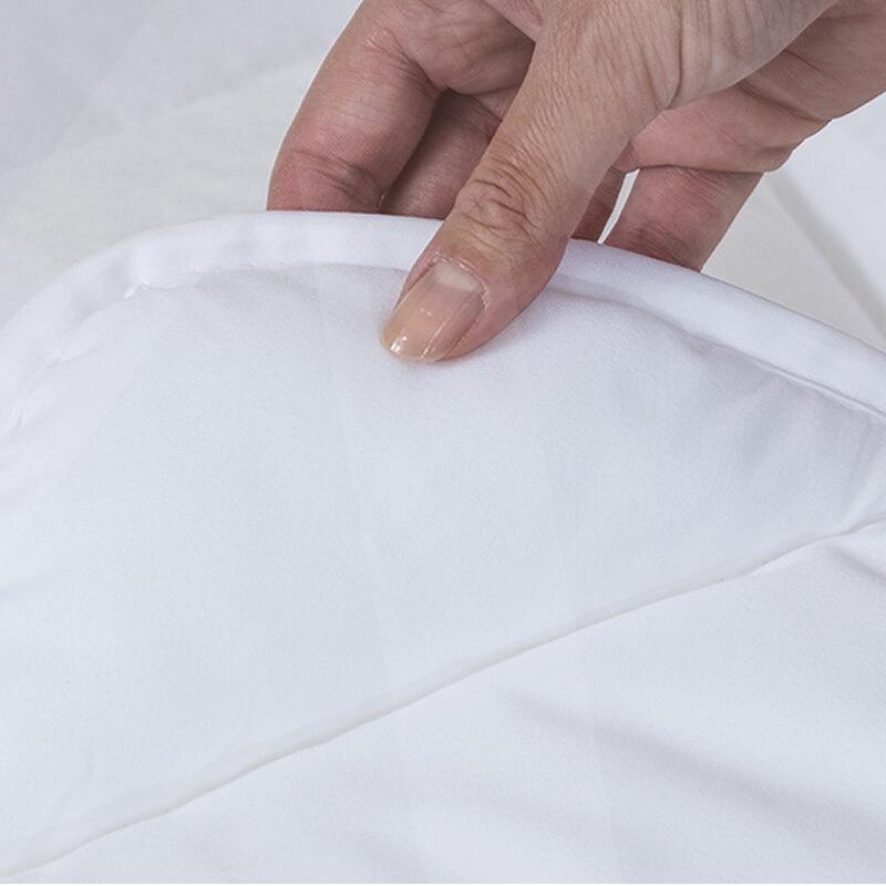 Topper de fibra Economy anticaros; detalle de la esquina